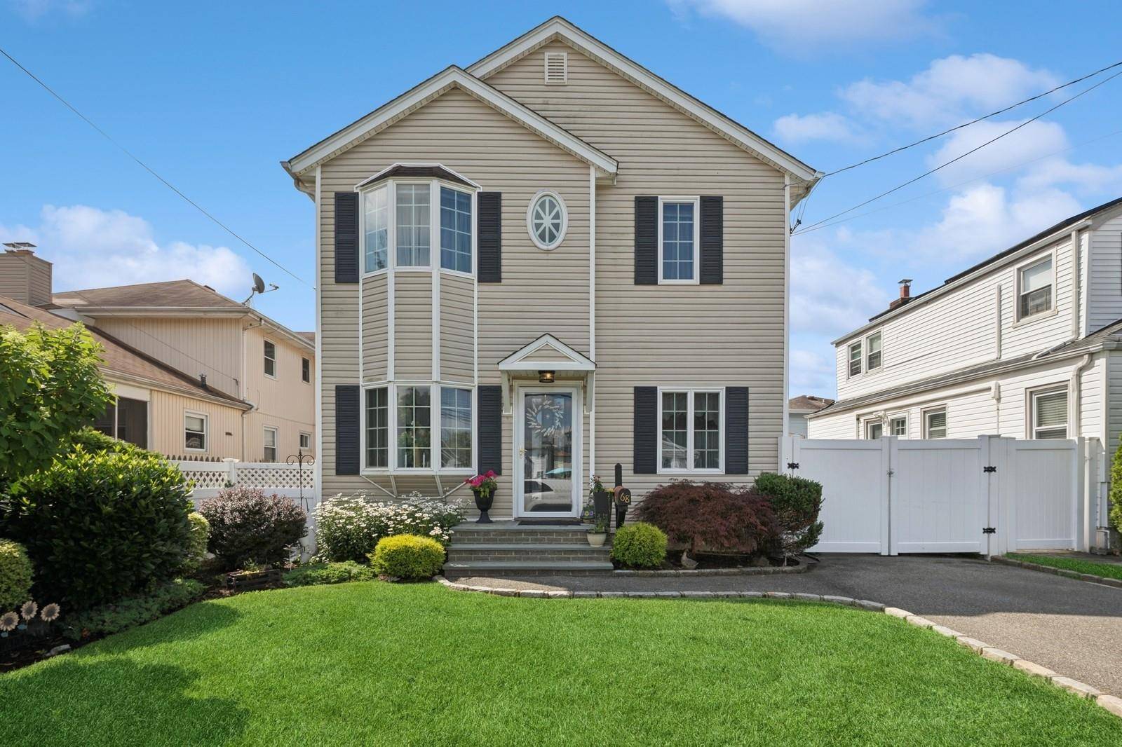 Welcome to this beautifully maintained 3 bedroom, 2 bath Colonial brimming with character and comfort.