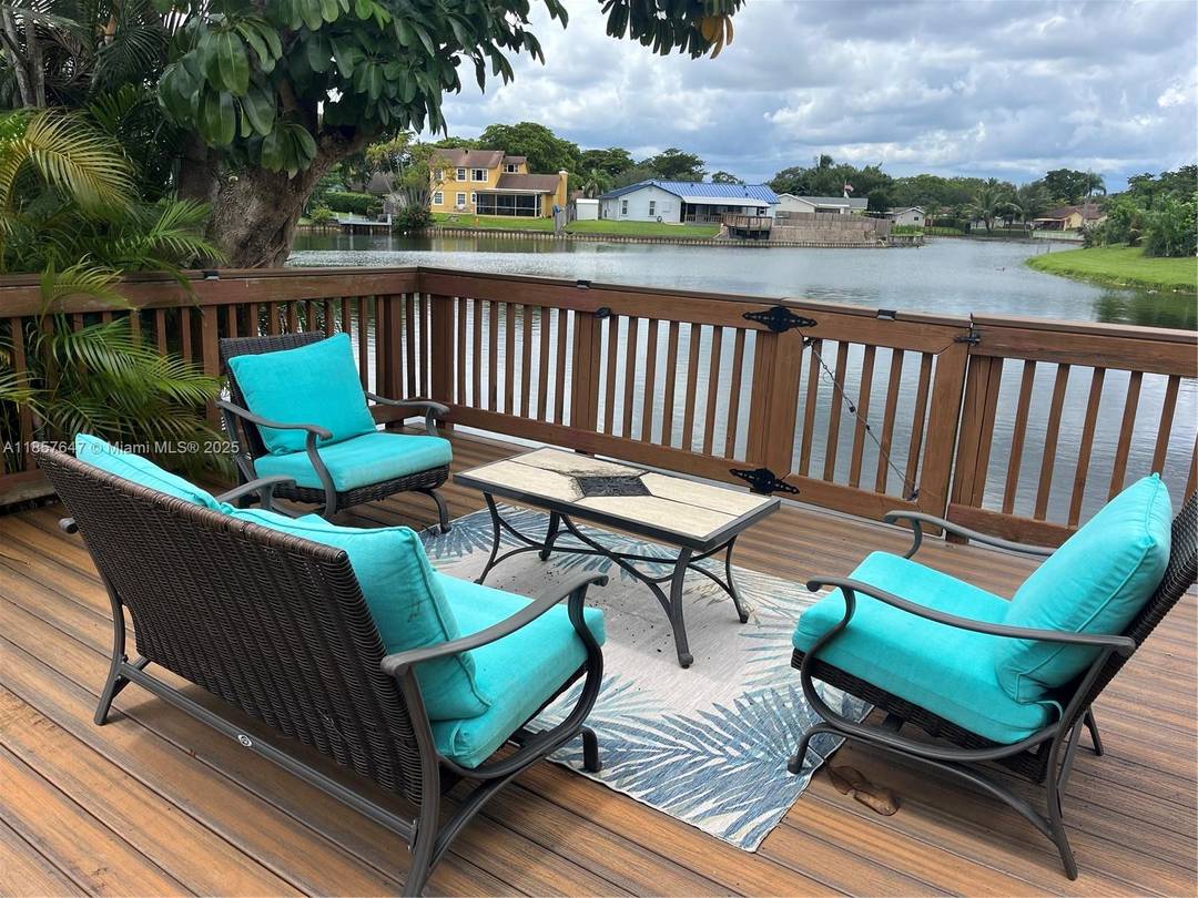 Lakefront 3 bedroom, 2 bath residence in highly sought after Cooper City neighborhood.