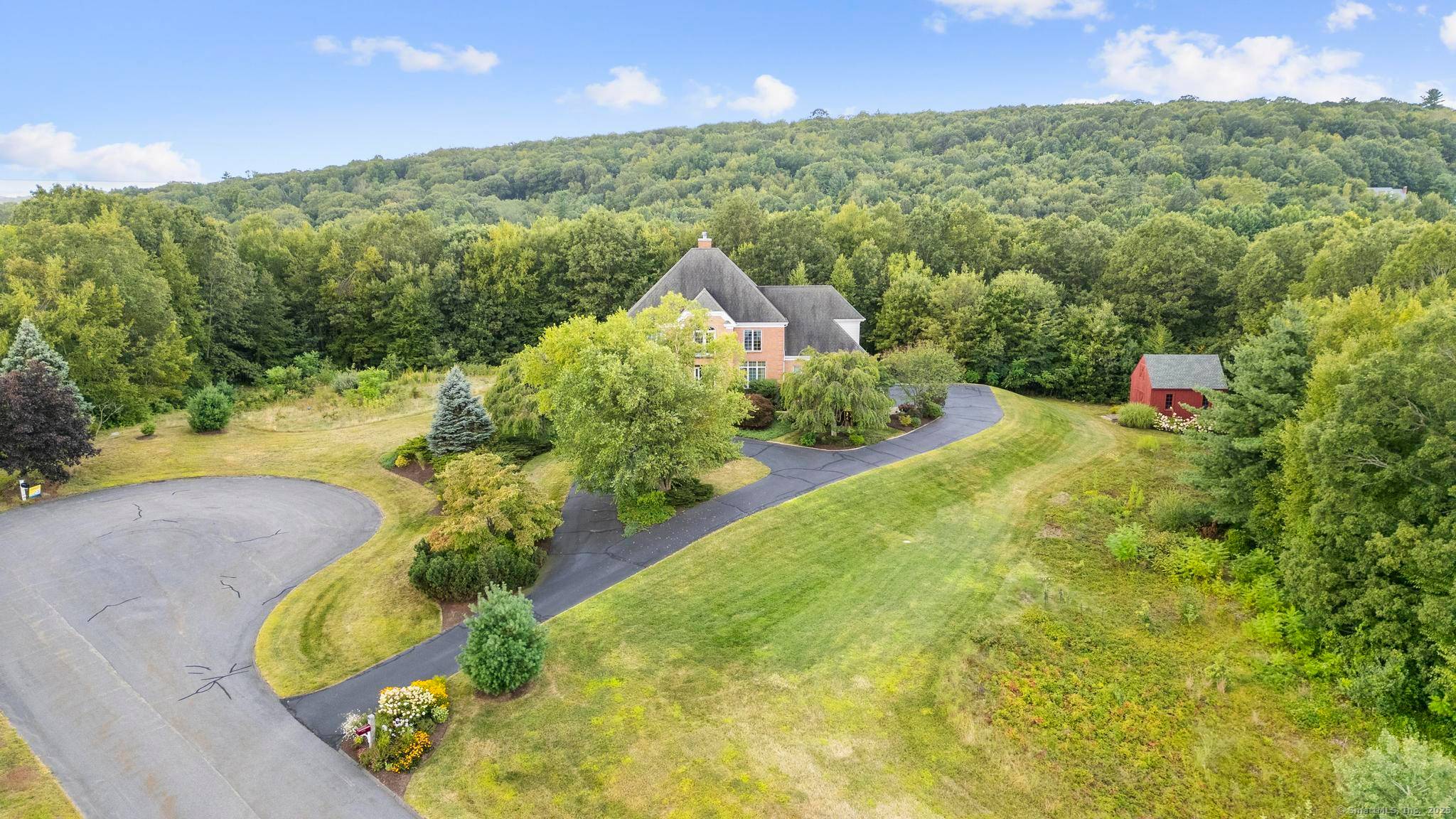 An iconic brick residence with true architectural pedigree, this home blends one of a kind design with the versatility of multi generational living and unmatched location.