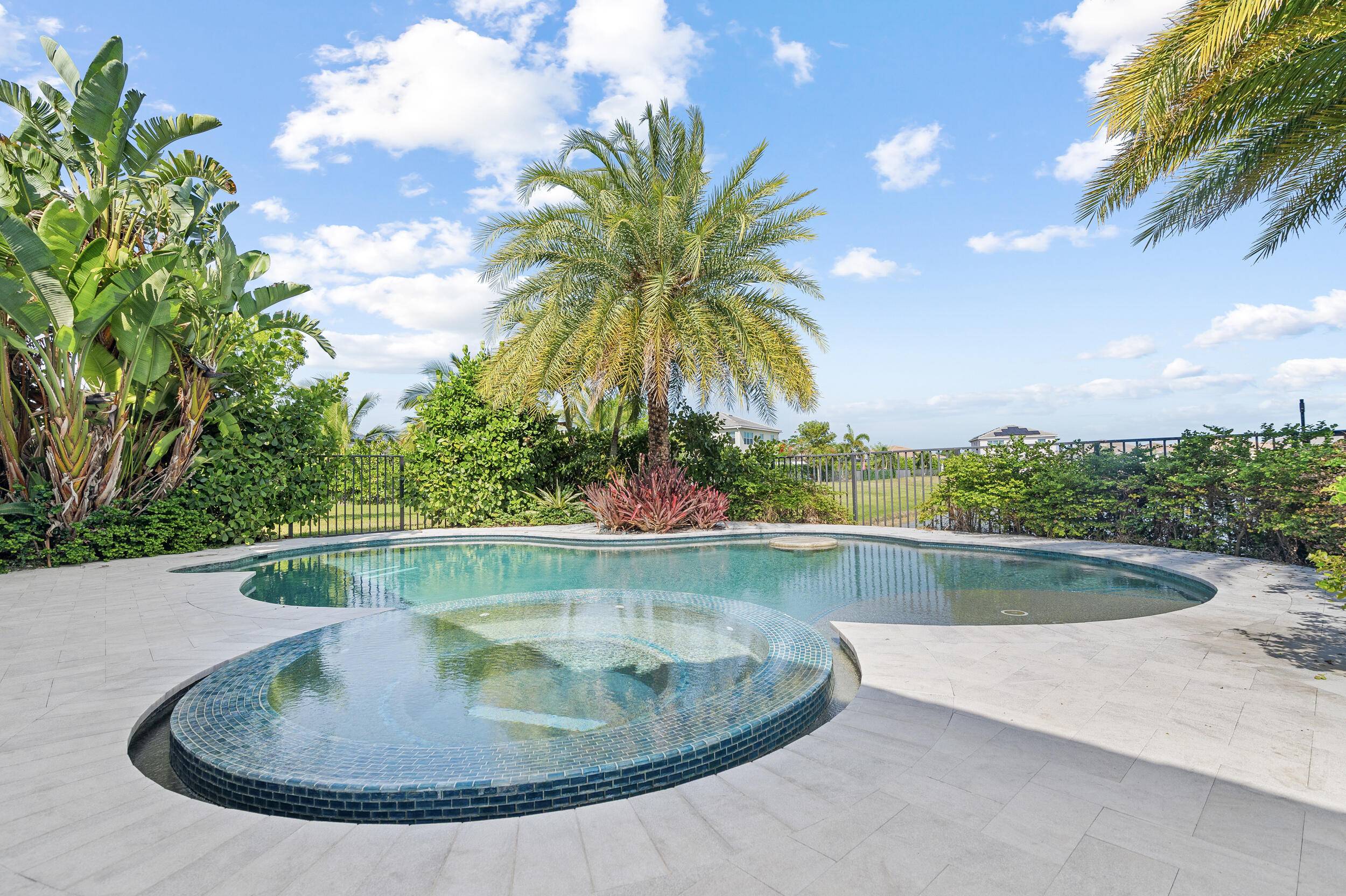 Welcome to 5934 Buttonbush Dr, the cheapest house with a pool in Westlake, Florida, located in the serene Hammocks community.