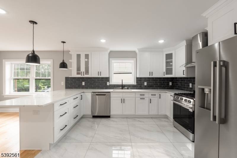 Welcome to this fully renovated, turn key two story apartment offering 4 bedrooms, 3 full bathrooms, and high end finishes throughout.