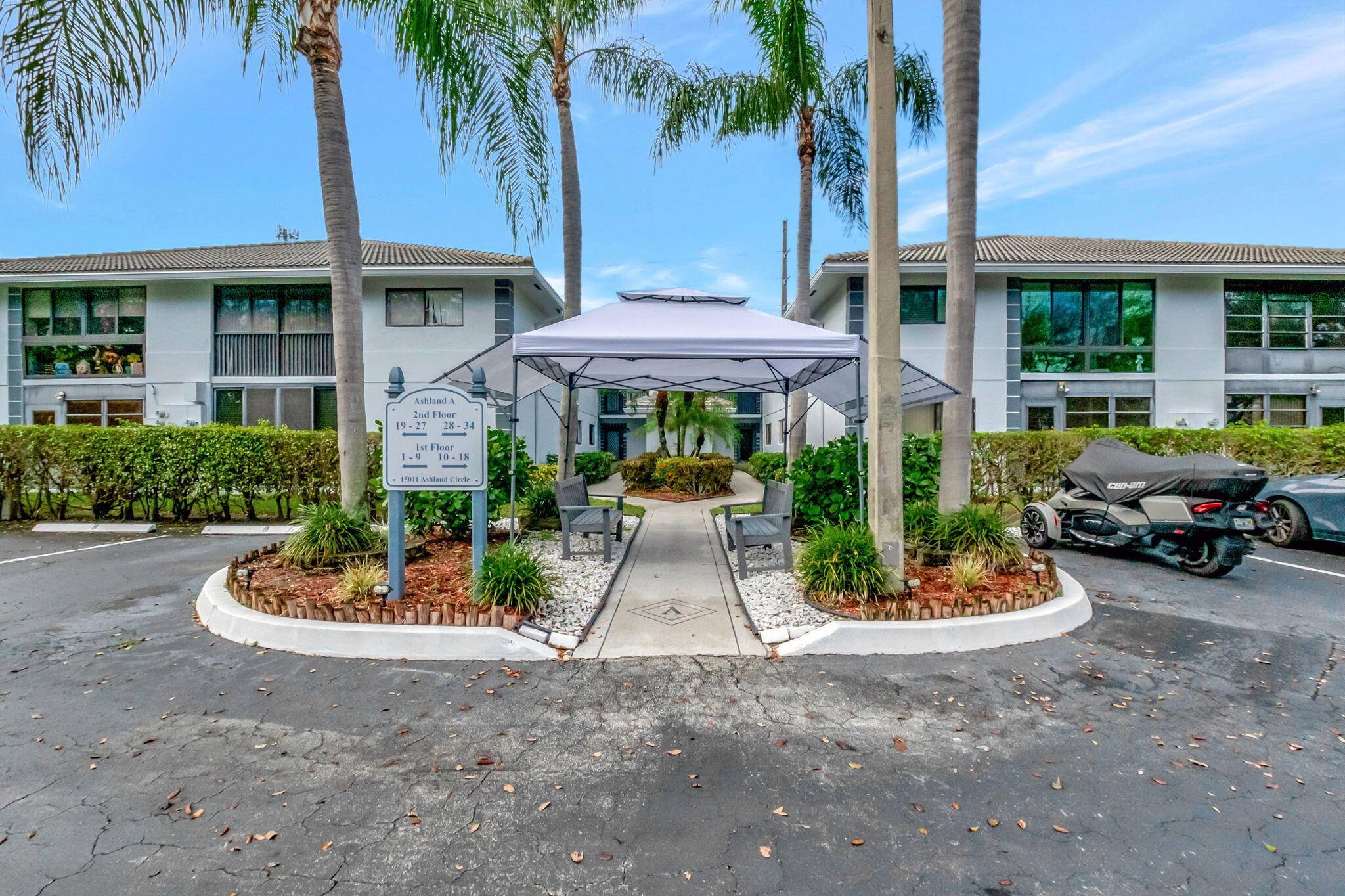 This 2 2 in the 55 community of Lakes of Delray netural tile flooring throughout the unit.
