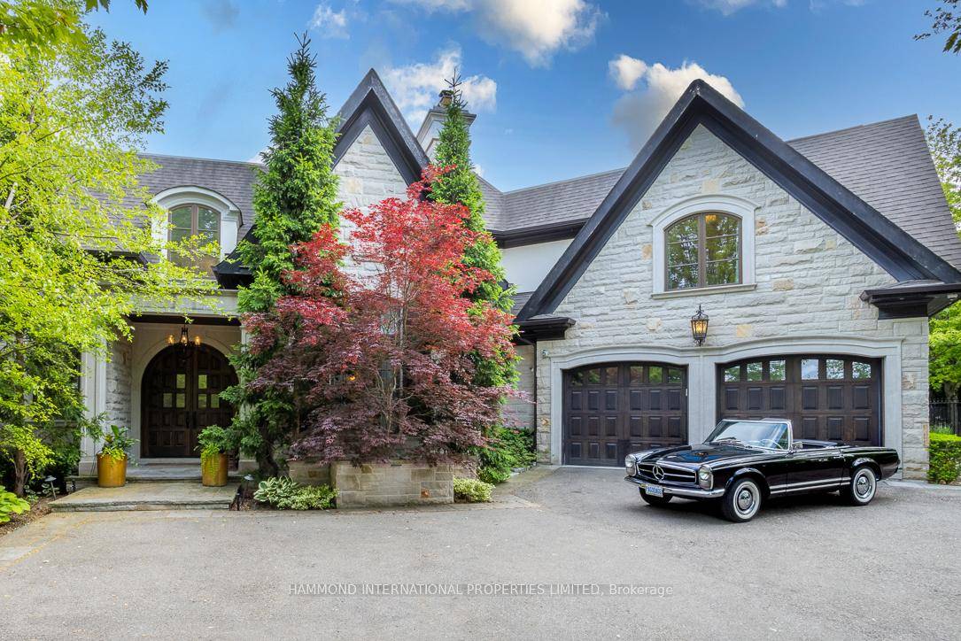 A breathtaking estate that seamlessly blends timeless sophistication with luxurious modern living.