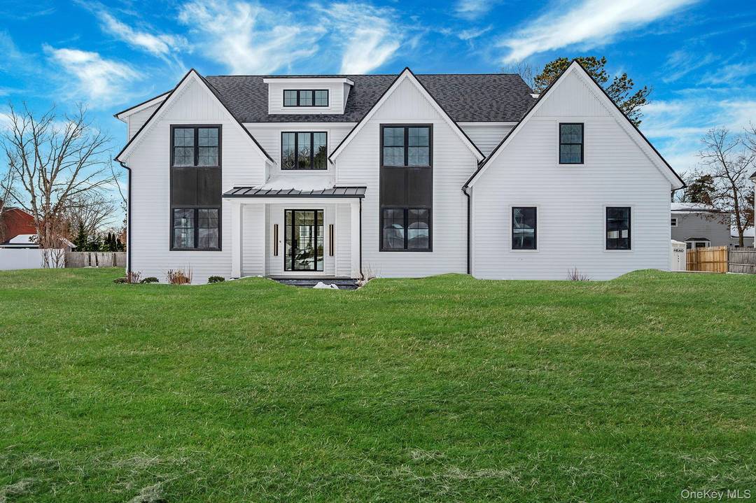 New construction Colonial in Miller Place offering approximately 3, 176 sq ft with 4 bedrooms and 3 bathrooms.