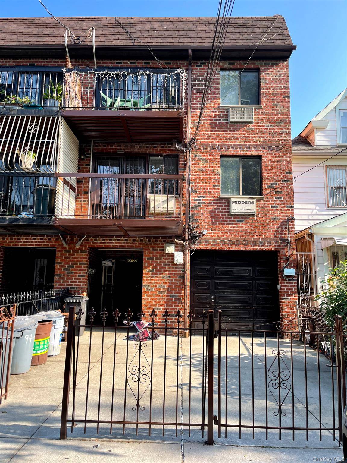 Legal 3 Dwelling Solid Brick Semi Attachment House In The Heart Of Elmhurst.