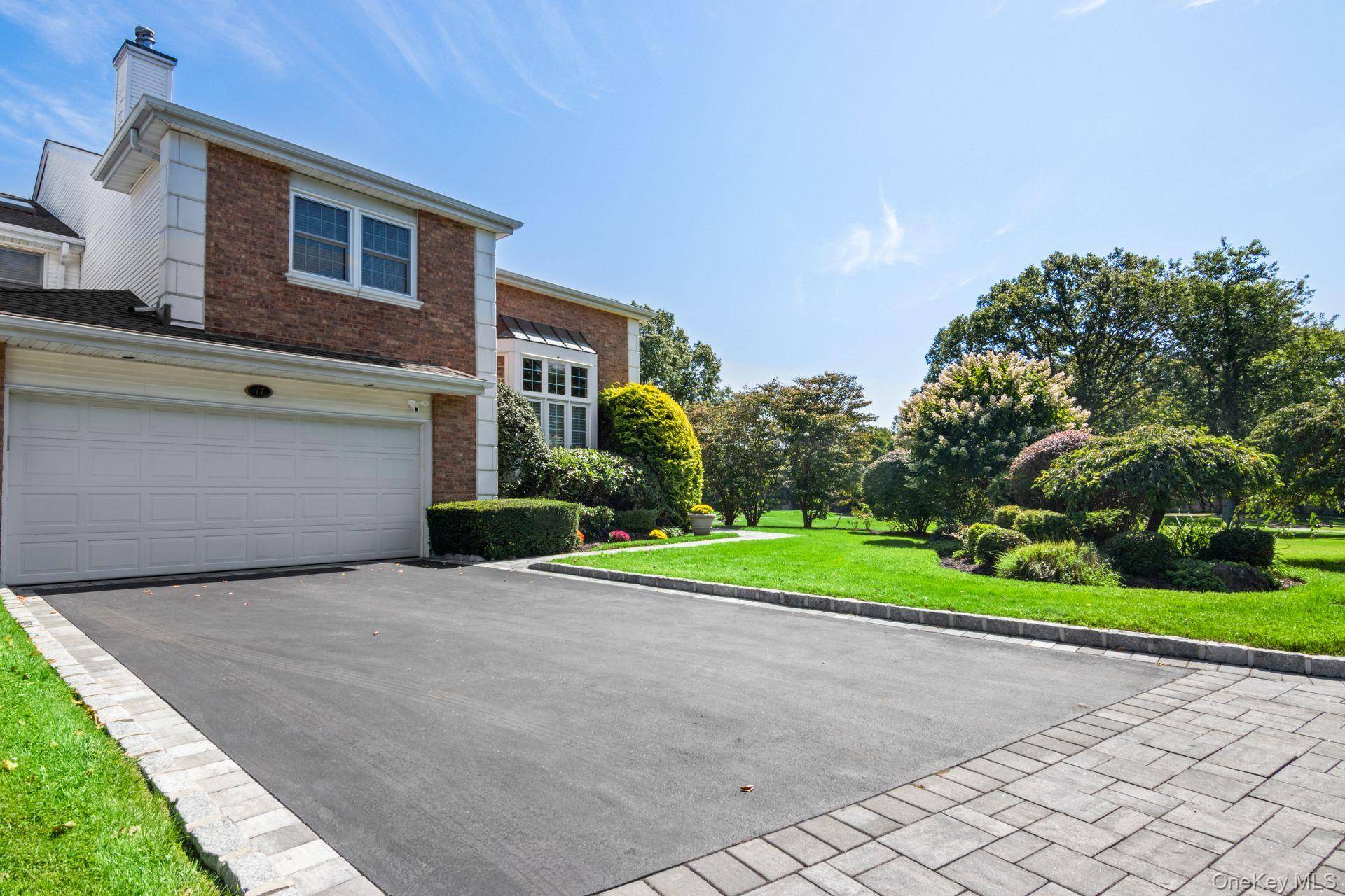 Welcome to luxury living in the prestigious, gated community of The Hamlet Golf and Country Club of Commack.