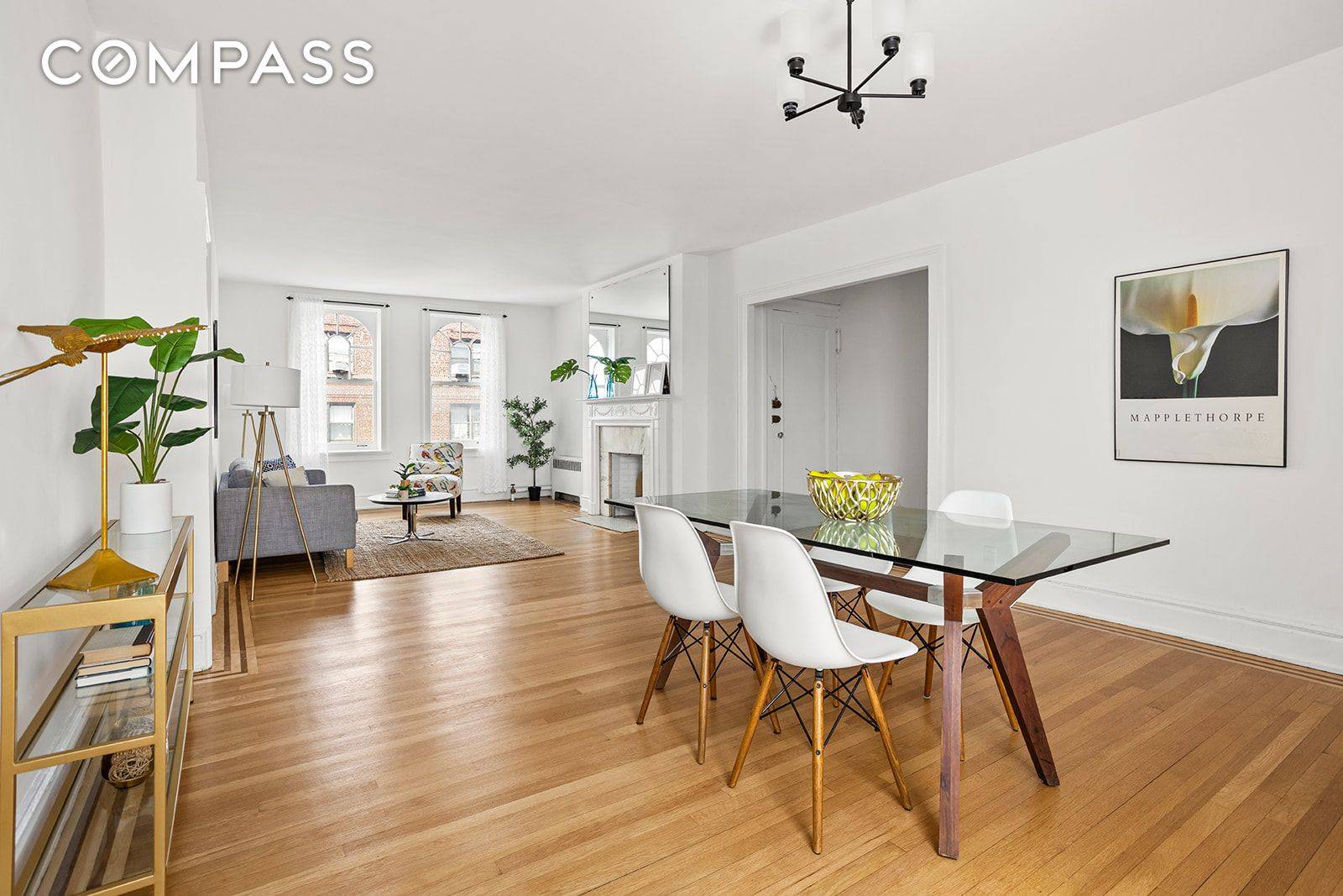 Super sunny top floor, pre war 2BR 2BA coop in coveted Hawthorne Court, the heart of the Jackson Heights Historic District.
