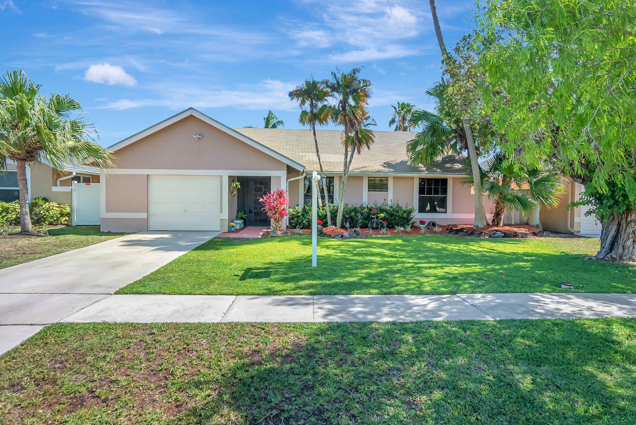 Welcome to this charming 3 bedroom, 2 bathroom home offering 1, 459 square feet of well designed living space in popular West Boca Raton.