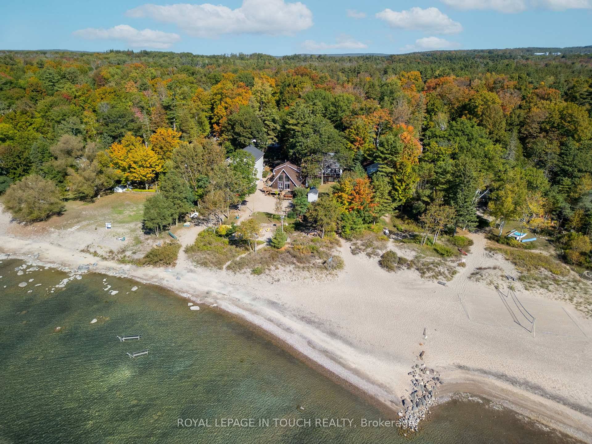 This stunning waterfront retreat on Georgian Bay offers a highly sought after sandy beach.