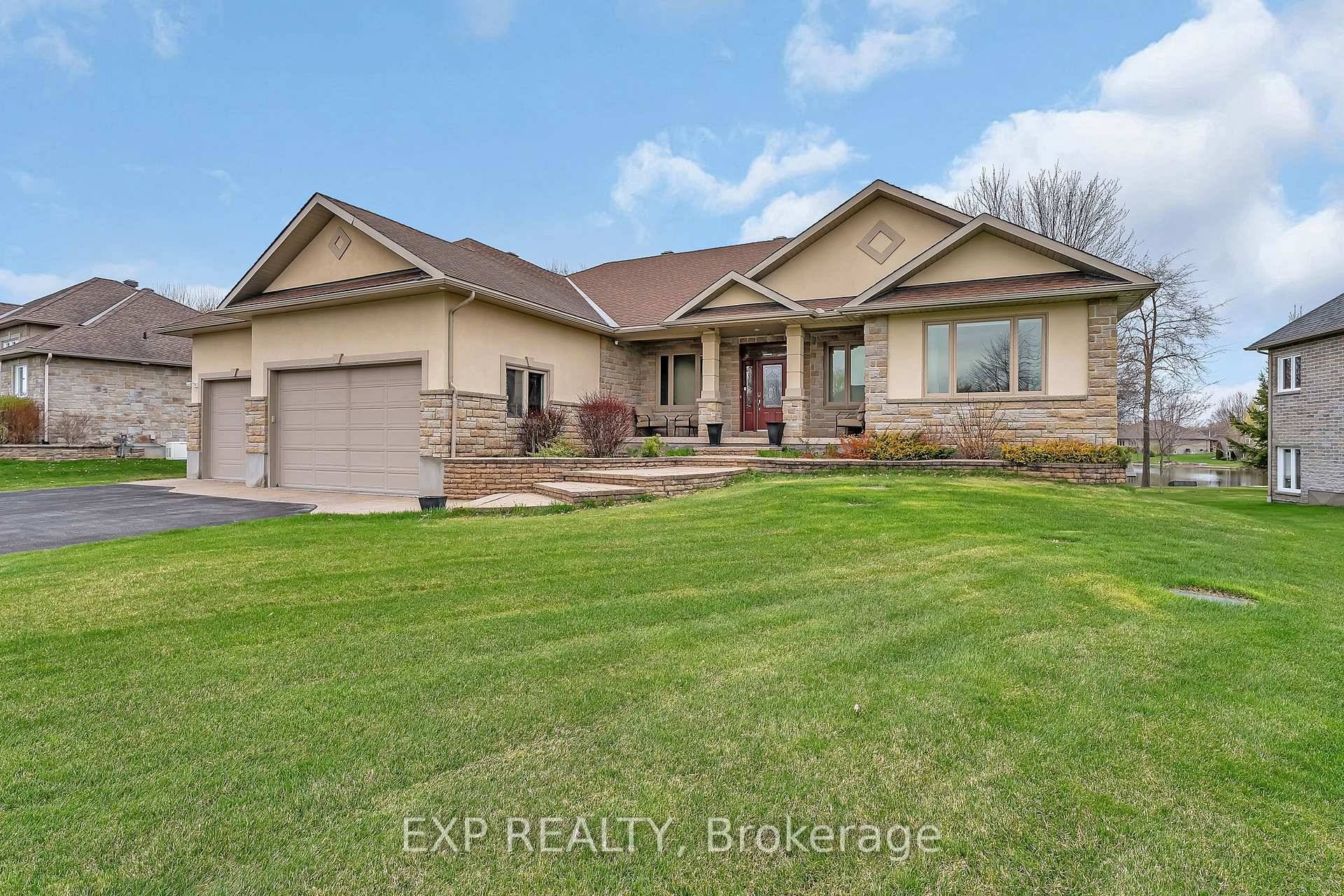 Welcome to 6703 Suncrest Drive a rare opportunity to own a waterfront luxury bungalow in one of Greely's most sought after communities.