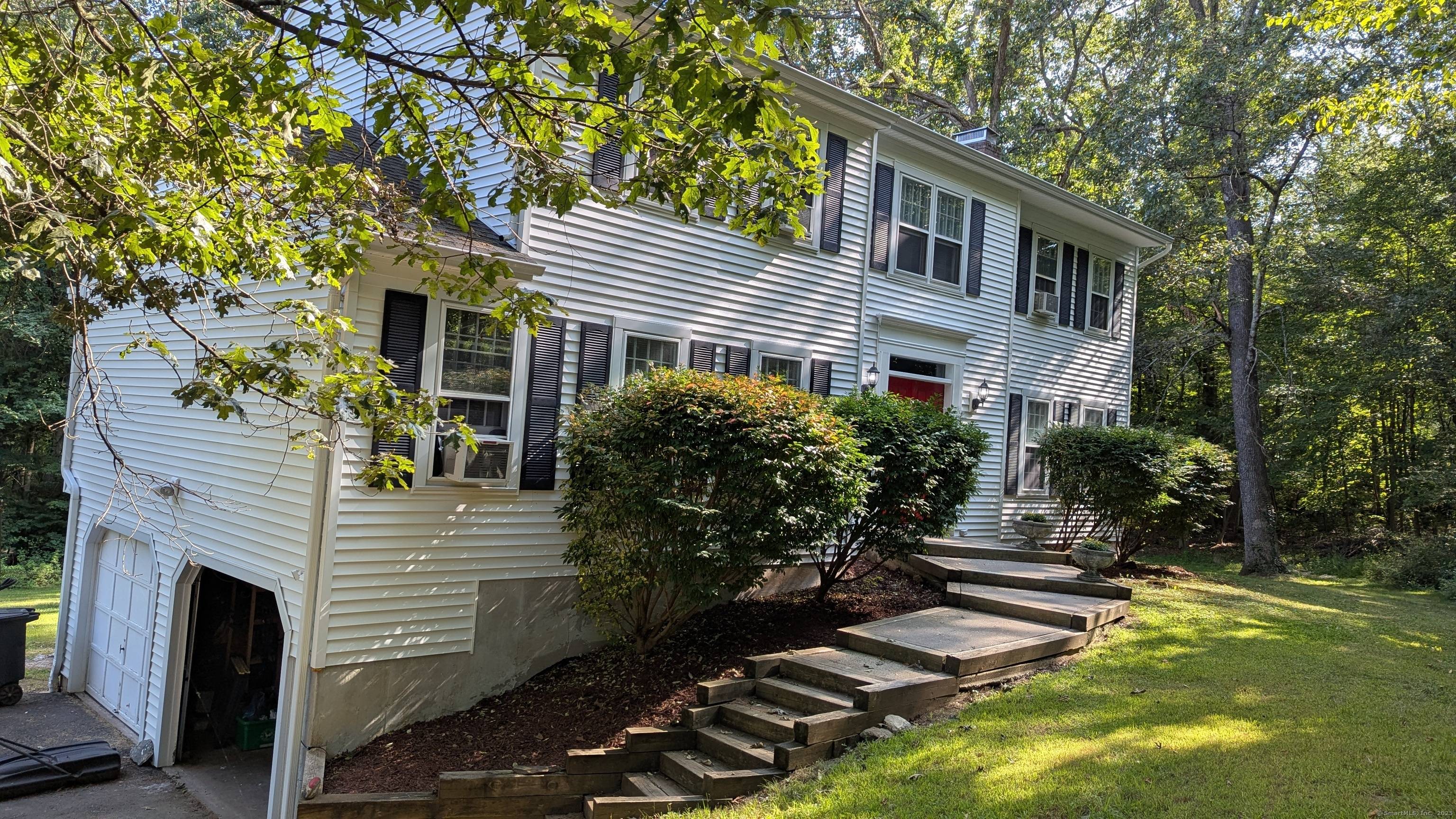 Welcome to this stunning four bedroom, two and a half bath colonial nestled on a cul de sac with a 1 private acres in picturesque Sandy Hook.