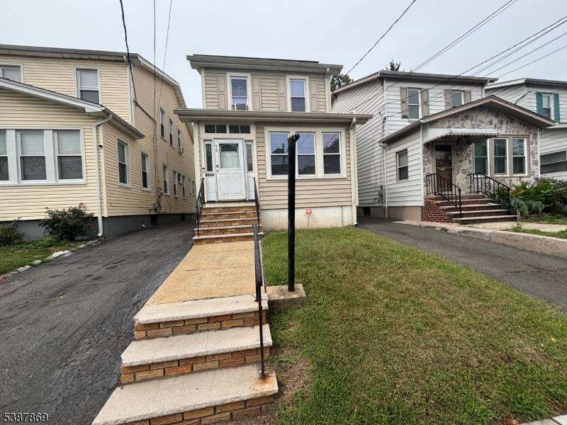 Welcome to this charming 3 bedroom, 2 bathroom home featuring original hardwood floors and a spacious layout.