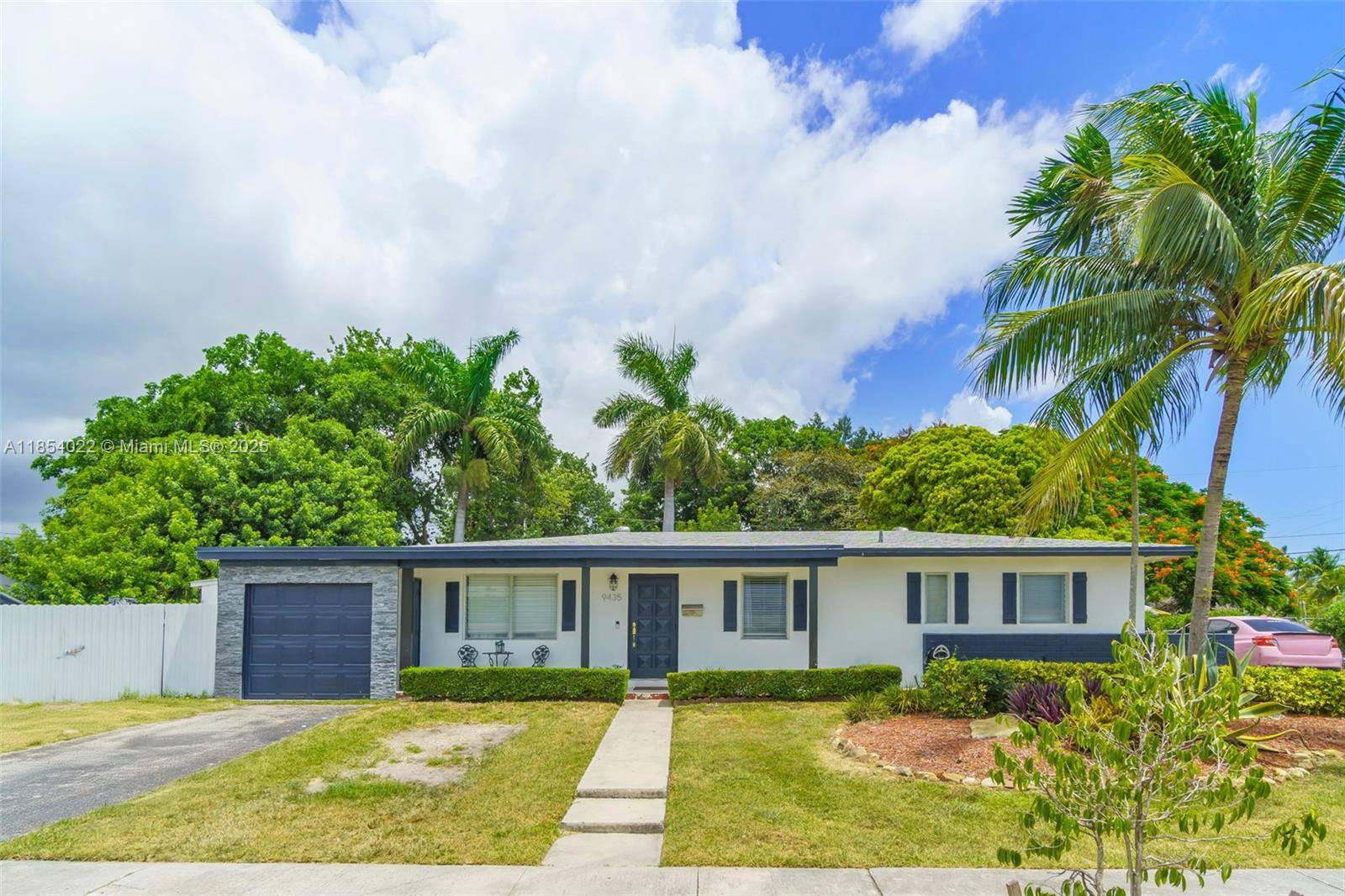 Spacious 3 bedroom, 2 bath home with an additional guest suite featuring a private bath, situated on an oversized 11, 201 SqFt lot.