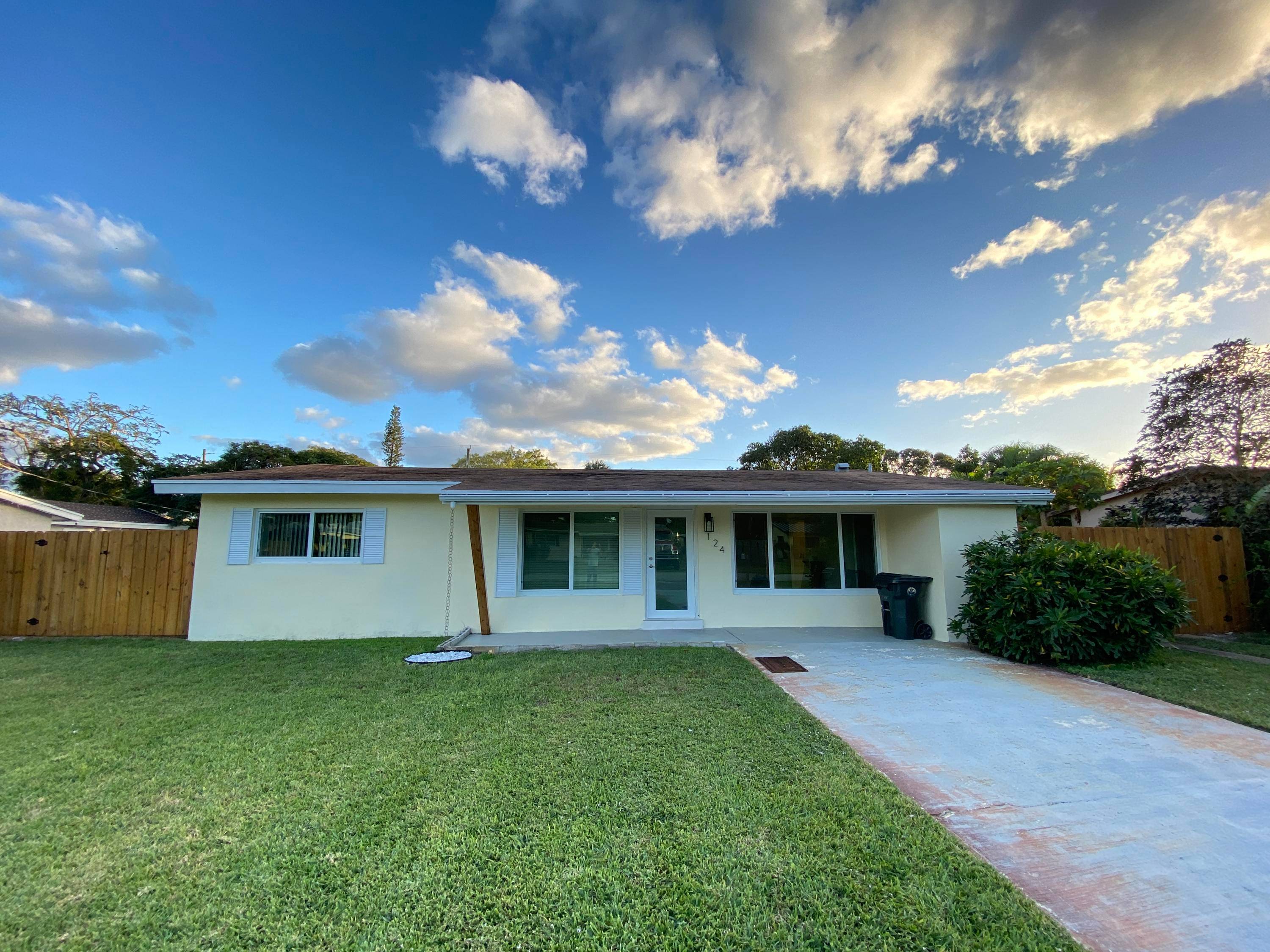 This renovated single family house, featuring new flooring and a beautiful new master bathroom.