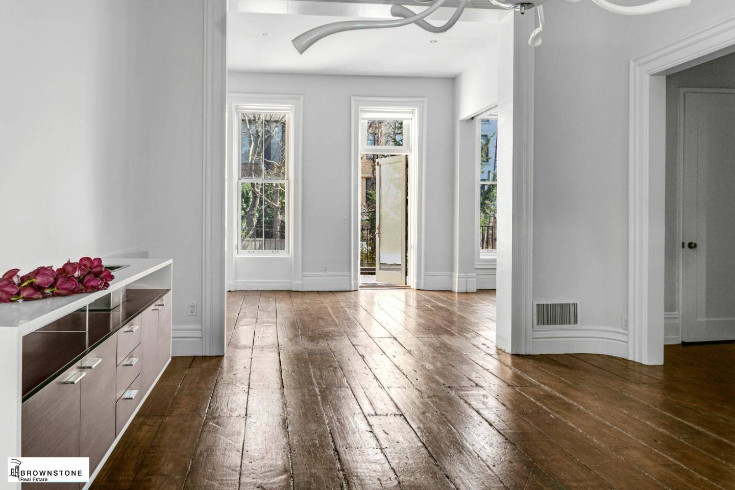 On a tree lined street in Historic Cobble Hill, 471 Henry Street is a beautiful brownstone townhouse renovated and redesigned to blend the feeling of an historic home with amenities ...