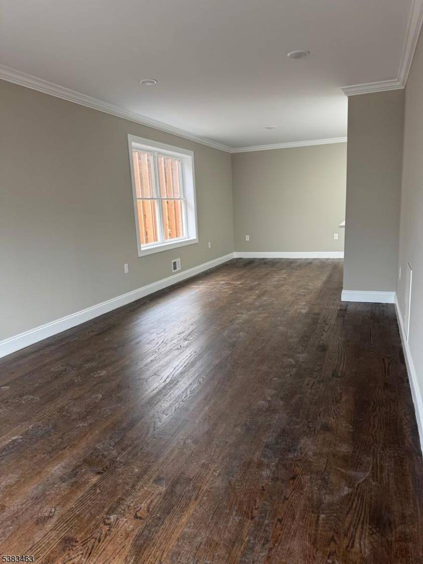 Brand new construction 2 family with first unit having 3 bedrooms and 3 full bathrooms.