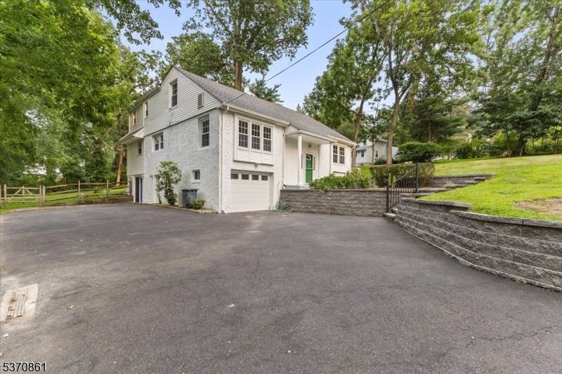 Sunny custom home with tasteful updates throughout.