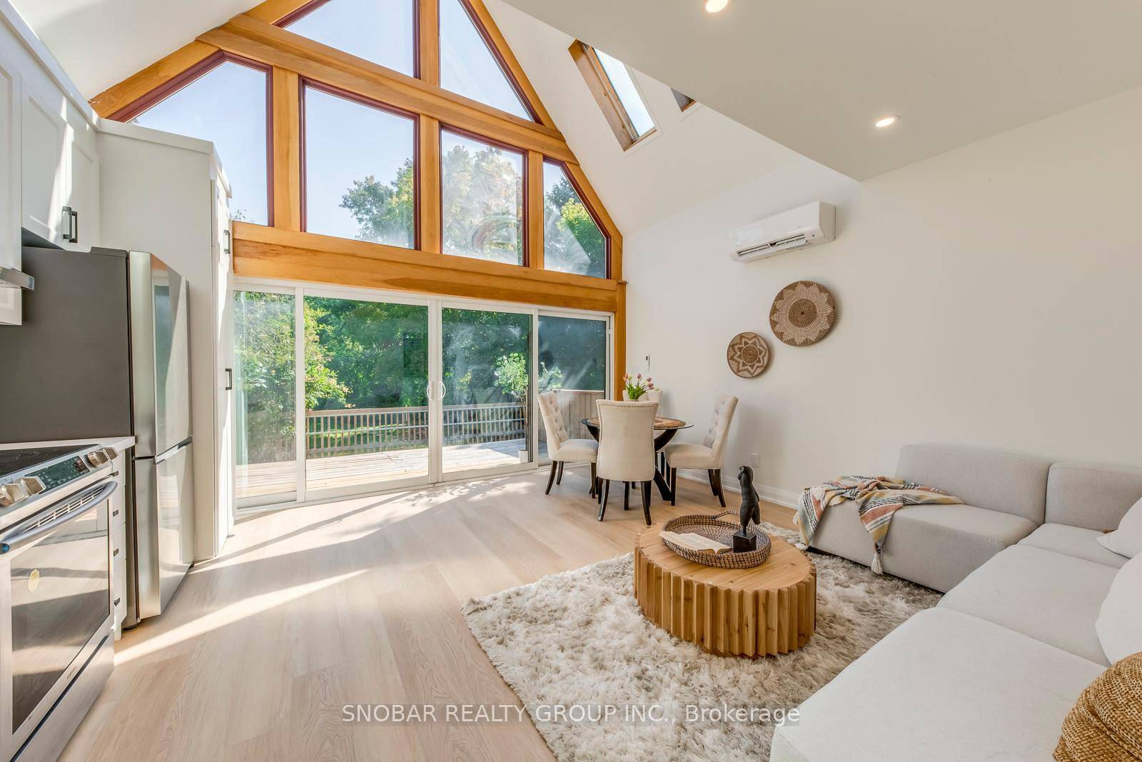 Stunning fully renovated home with 3 self contained legal units, each with it's own kitchen, laundry, entrance, and hydro meter.