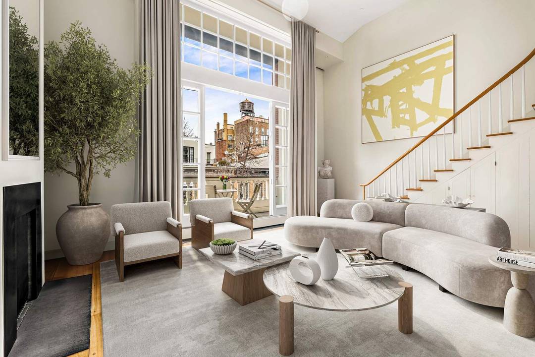 This extraordinary mint condition triplex penthouse at 52 West 9th Street is a light filled, architecturally significant residence on one of Greenwich Village s most distinguished blocks.