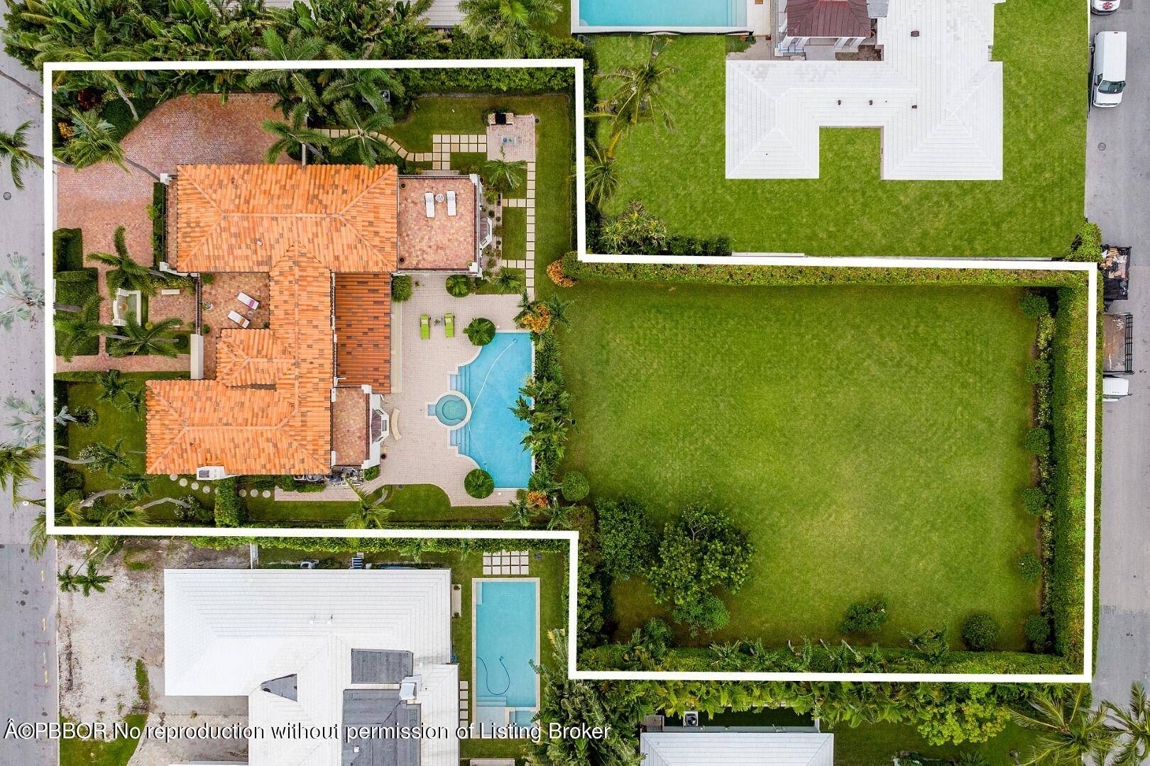Stunning home on fantastic, rare double 26, 500 square foot lot in Palm Beach's North End.