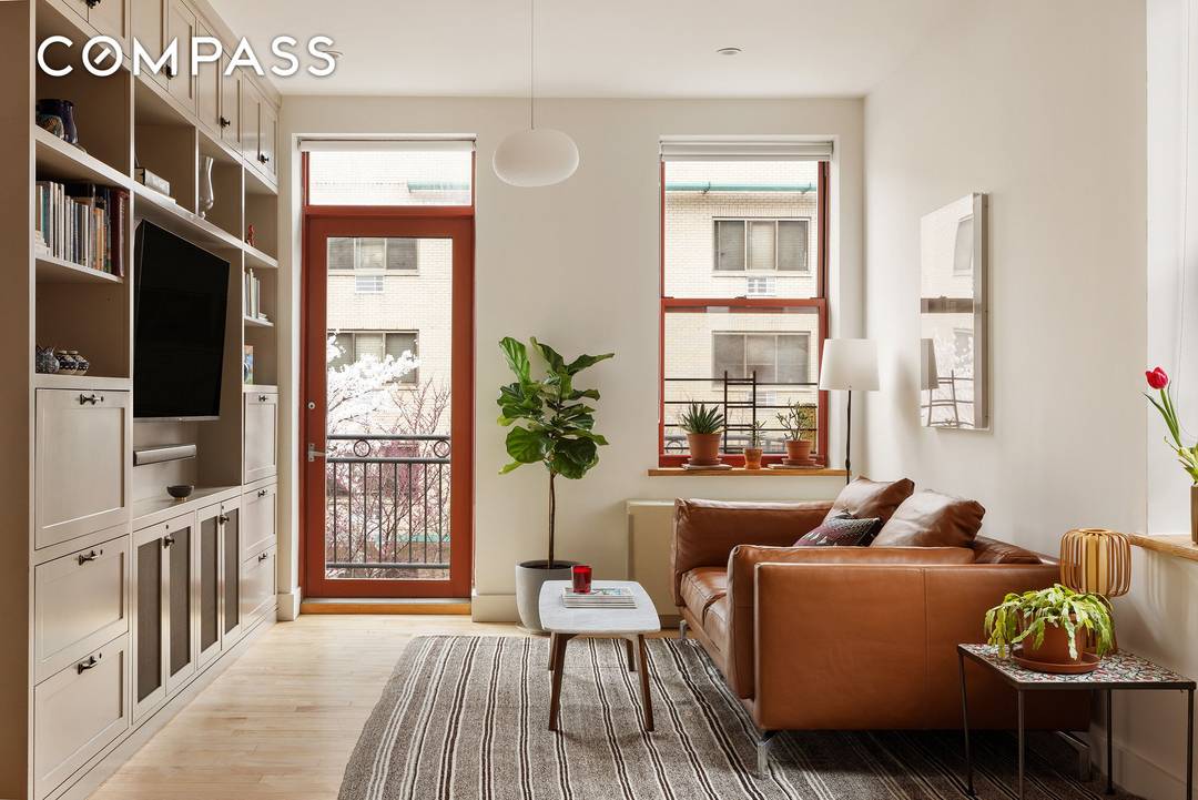 Nestled on the charming Tiffany Place, a picturesque cobblestone street in the historic Columbia Street Waterfront, this newly renovated, converted warehouse condo masterfully blends timeless character with contemporary elegance.