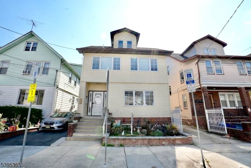 Welcome home to this beautifully maintained two family home offering incredible space, comfort, and versatility.