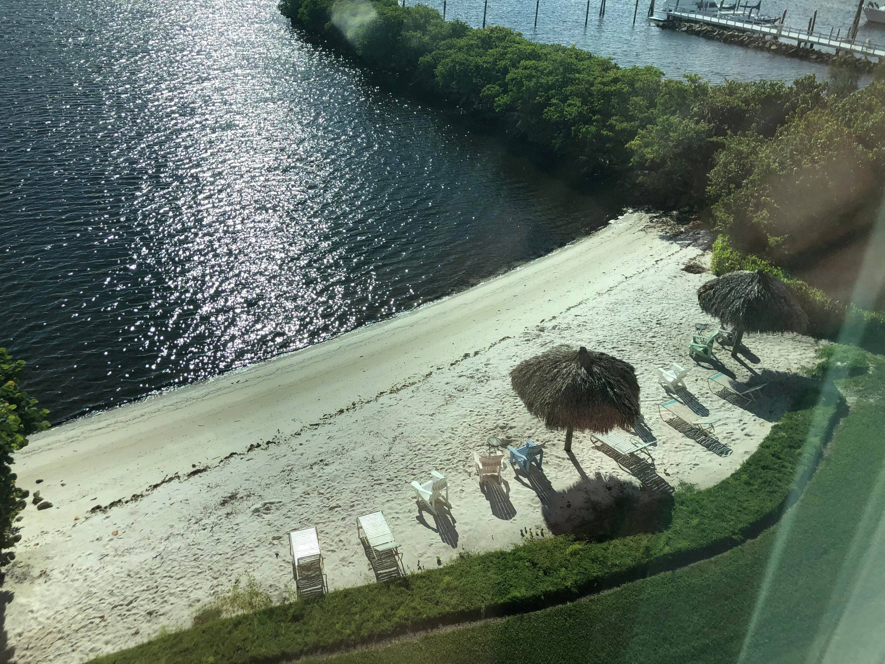 HIDDEN GEM, 3 BEDROOMS 2 BATHS W GARAGE W PRIVATE BEACH ON THE INTRACOASTAL.