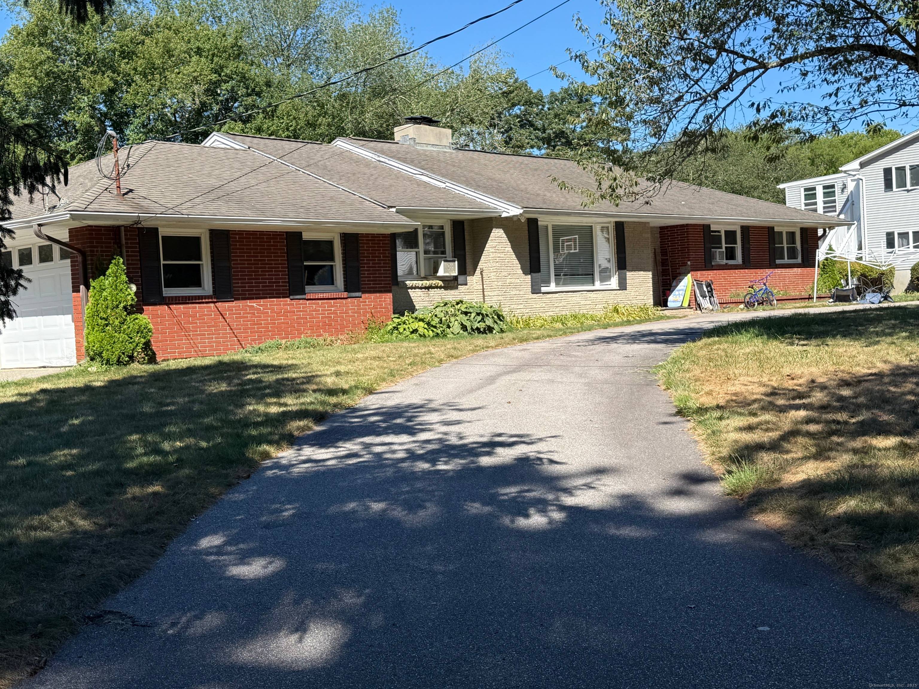 Large, sprawling ranch with an open floor plan.