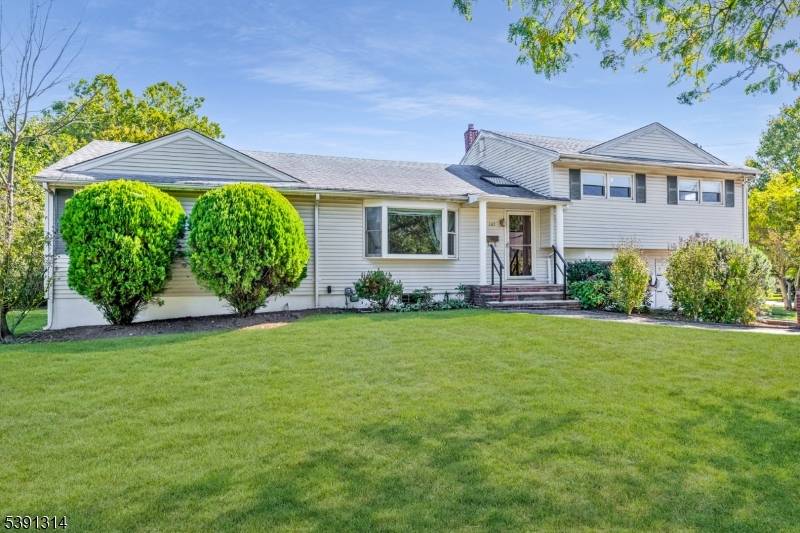 WELCOME TO THIS EXPANDED SPLIT LEVEL IN MONTCLAIR HEIGHTS !