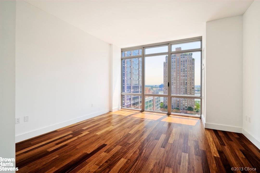 Apartment 19C is a stunning 2 bedroom, 2 bathroom residence with south and east exposures, open city and river views.