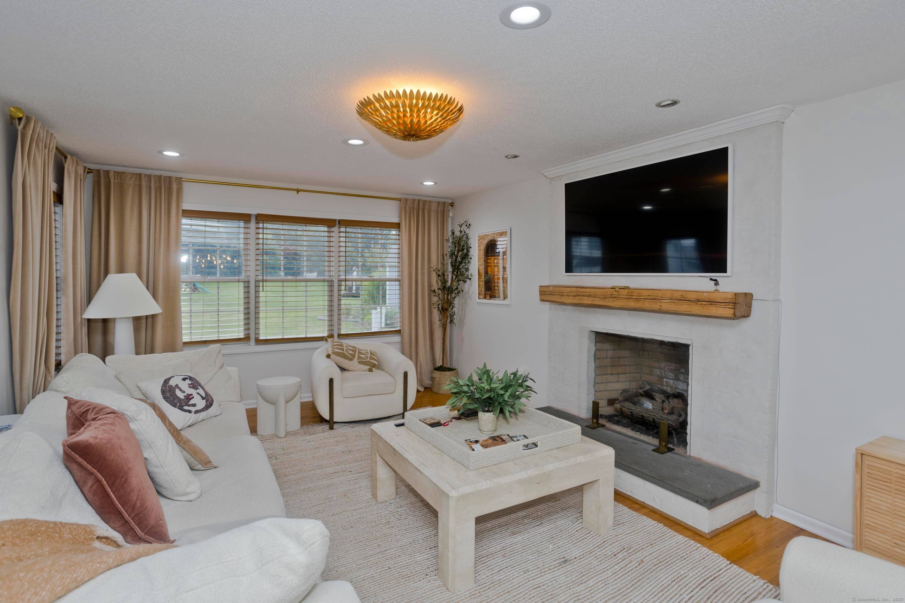 Stately, custom built Colonial nestled on a level lot with sweeping countryside views !