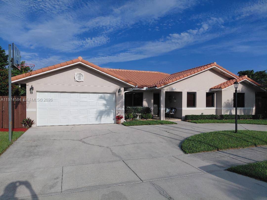 Remodeled 4 bedrooms 2 bathrooms 2 car garage home featuring formal living room, dining room, spacious family room that is open to the kitchen counter with granite countertops.