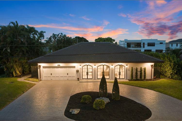 Welcome to an extraordinary waterfront residence in one of East Boca Raton's most desirable neighborhoods, where luxury, design, and the South Florida waterfront lifestyle come together.