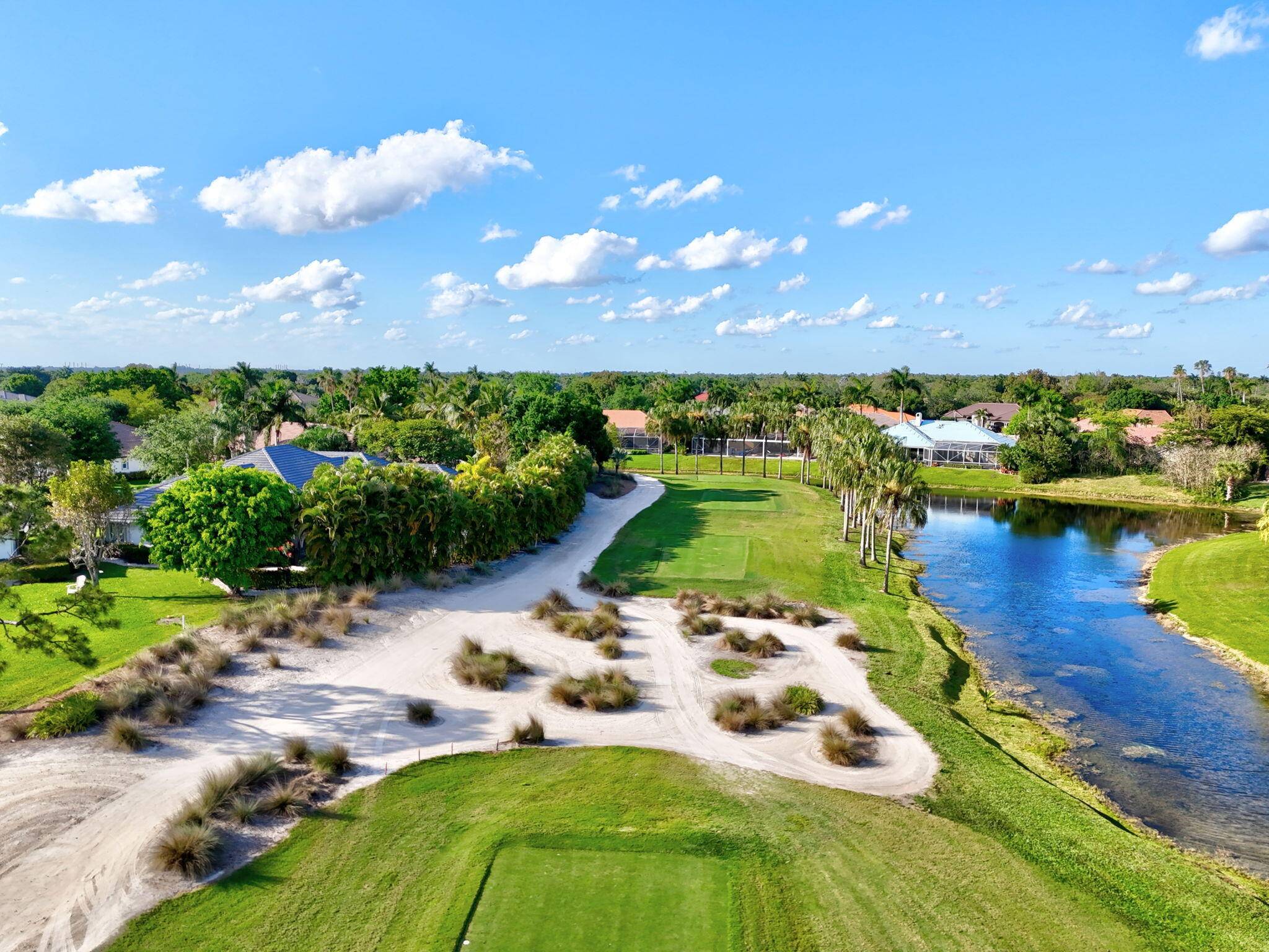NEW ROOF AND AIR CONDITIONERS Enviably set on the Wanderers Golf Course, this stunning 6 bed, 4 bath residence within the gated Lakefield West community is a must see !