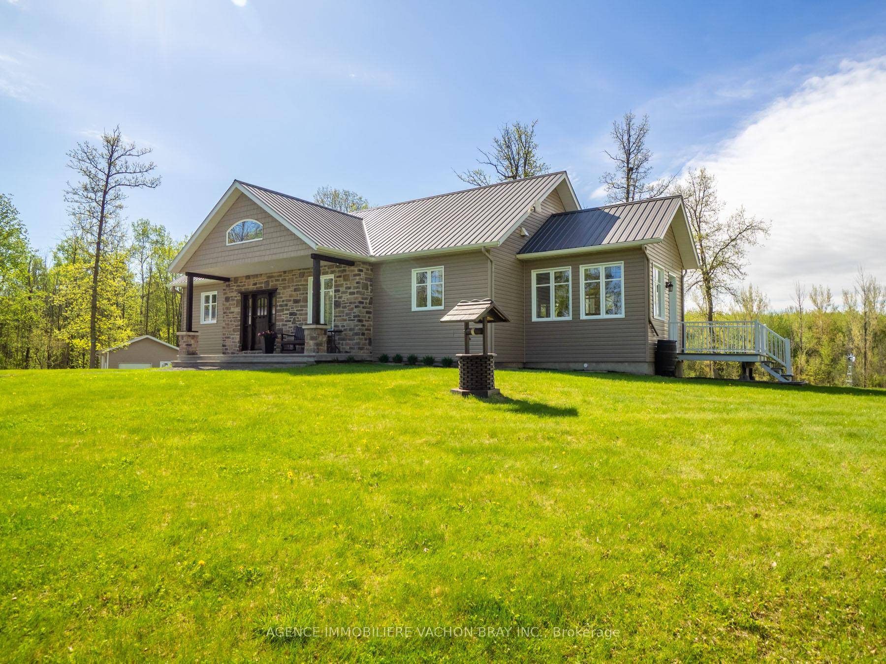 Apple Hill ! Nestled on a sprawling 66 acre private, treed lot, this stunny property offers the ultimate tranquility.