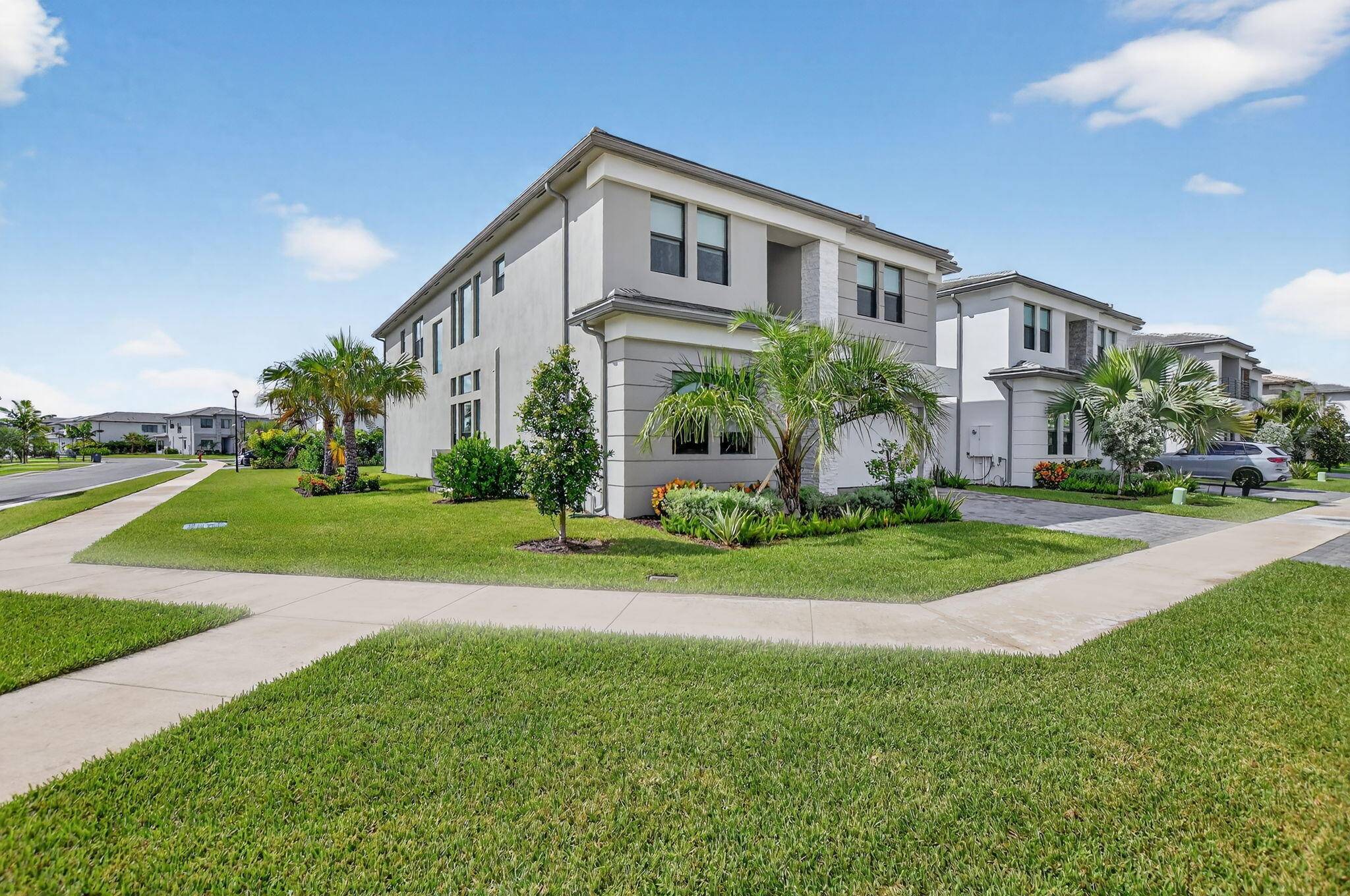 Discover this stunning Polynesia model on a rare oversized corner lot with southern exposure, filling the home with natural light from sunrise to sunset.