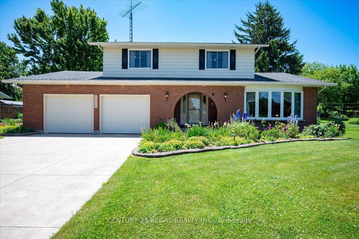 Don't miss out on this immaculately maintained home sitting on an enormous country size 100.