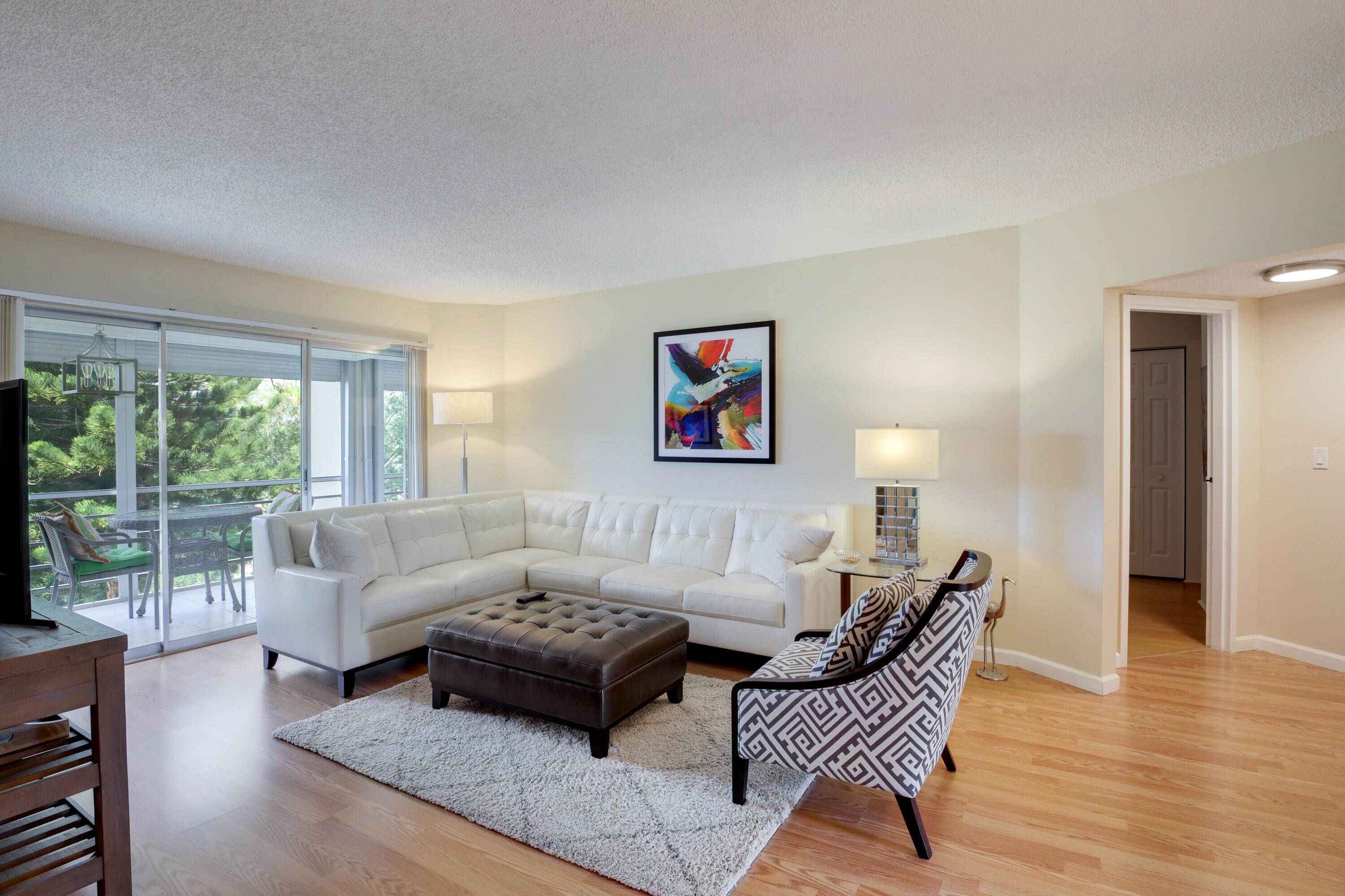 MOVE IN WONDERFUL ! ! EXCEPTIONAL, NATURALLY BRIGHT, SPARKLING, UPDATED CORNER CONDO AVAILABLE FULLY FURNISHED.