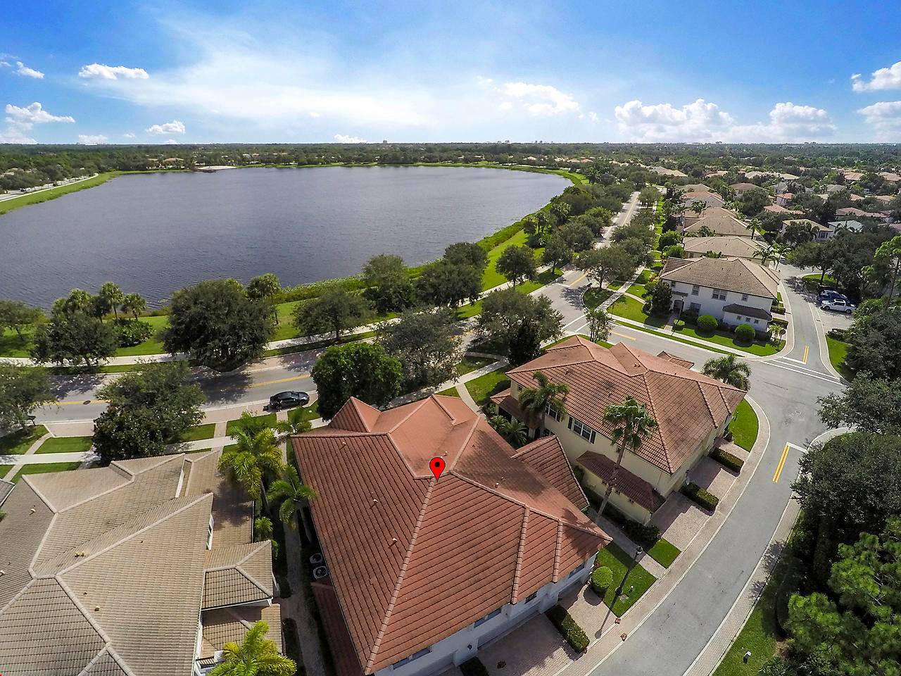 Freshly painted Town home with New Carpeting located Directly On Lake with 2 car garage.