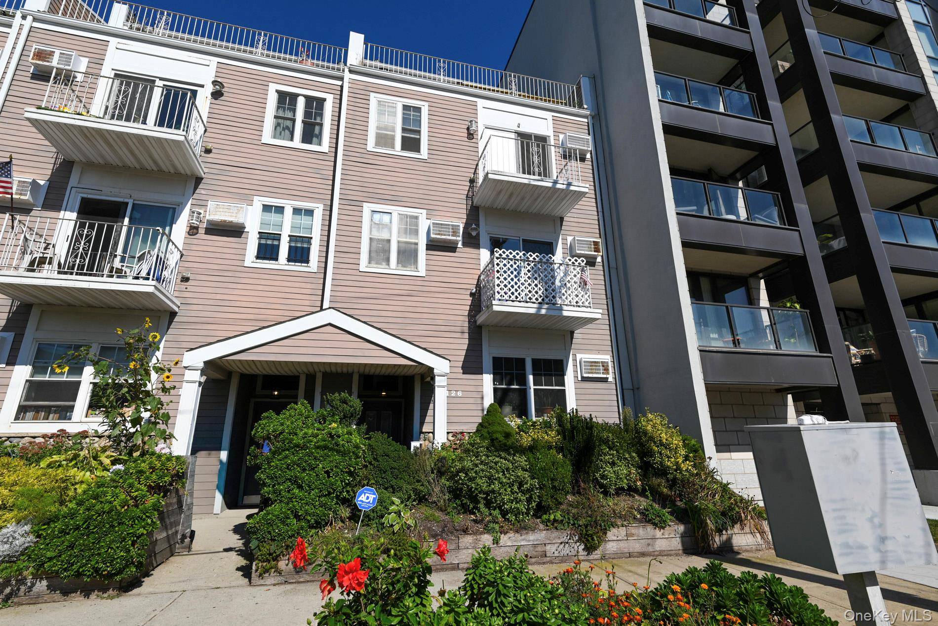 Large Duplex In Rockaway Beach With Ocean Views, This Duplex Features, Large Open Floorplan, Kitchen With Granite Counters and Stainless Steel Appliances, Balcony Off The Living Room, Primary Bedroom With ...