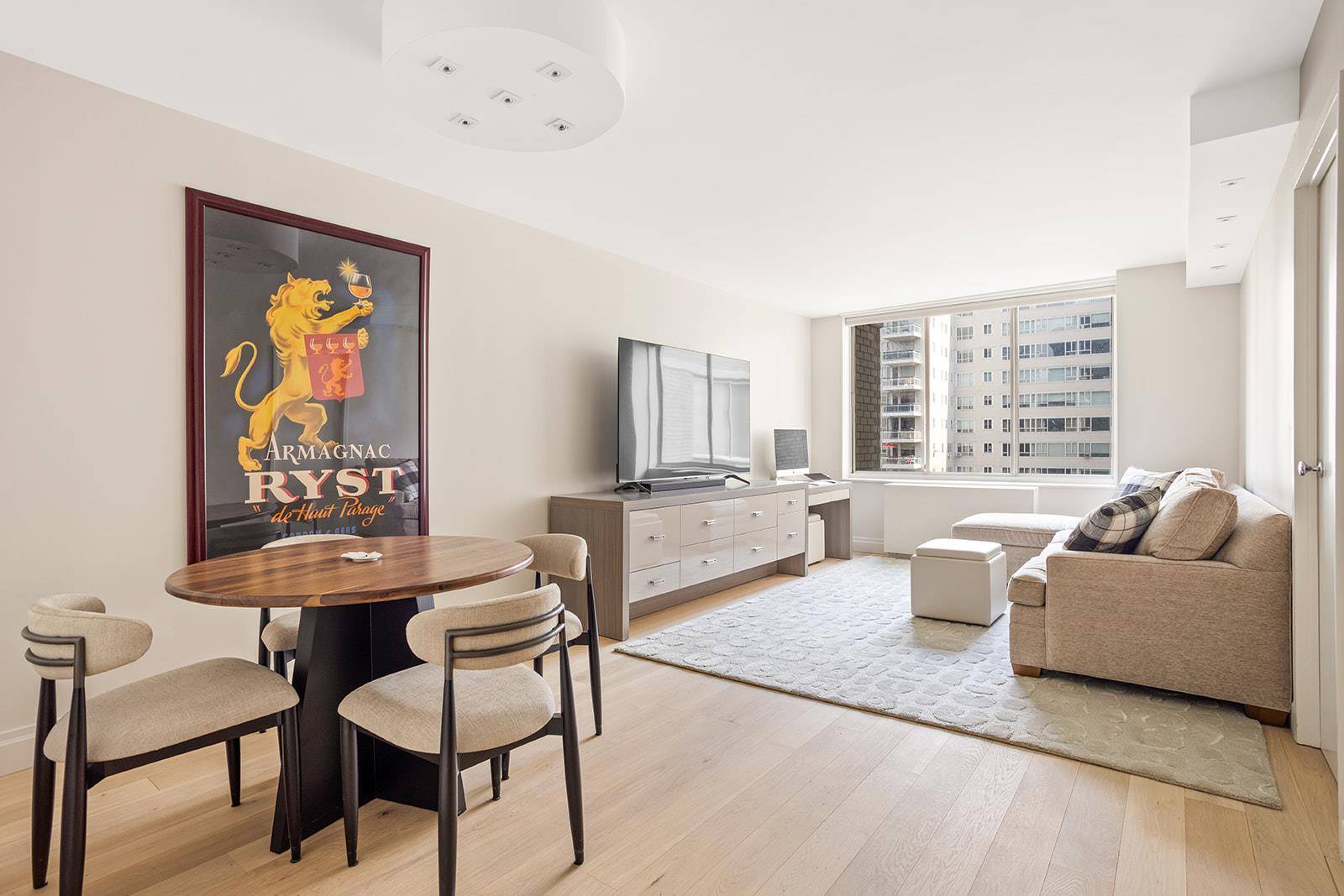 12J is in mint condition as a newly renovated one bedroom in a full service condo in Lenox Hill.