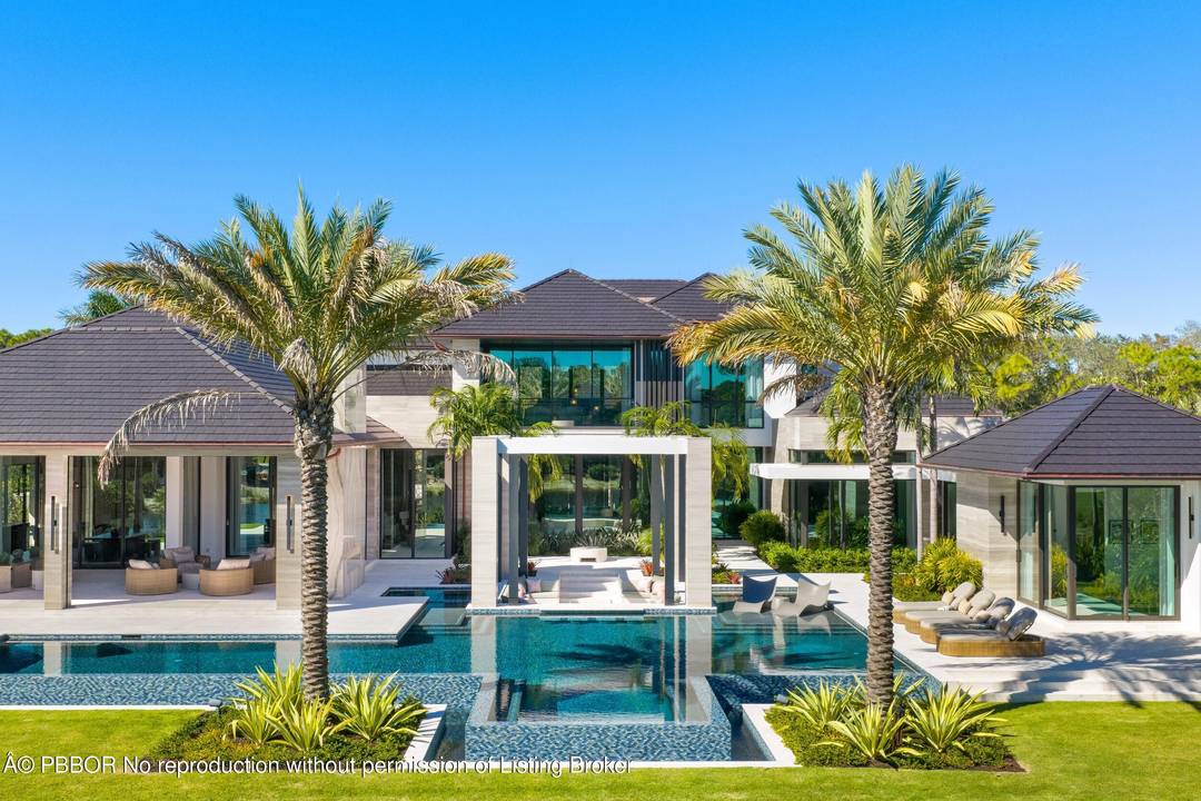 Set within the prestigious gates of The Bears Club, 228 Bears Club Drive is an exceptional estate that captures tranquil water vistas and sweeping golf course views, blending enduring craftsmanship ...