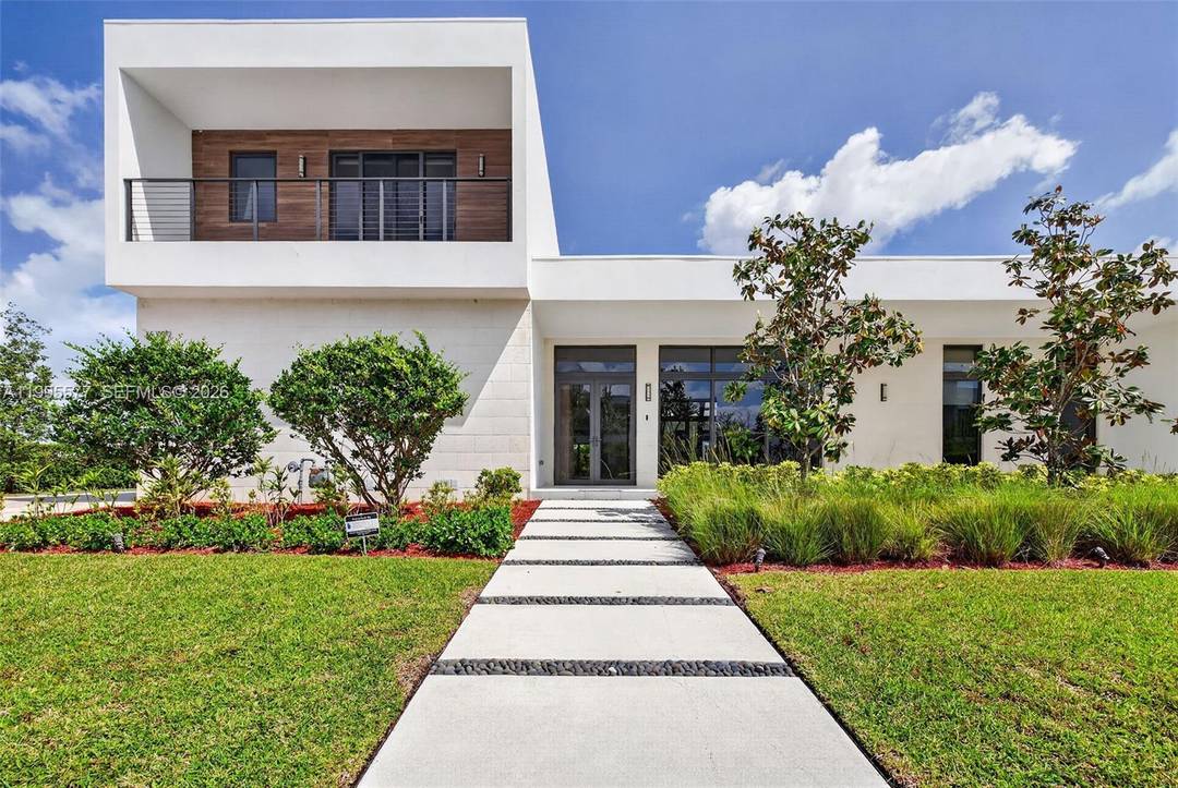 Welcome to an exceptional residence in the prestigious gated community of Botaniko in Weston, where modern elegance meets refined living.