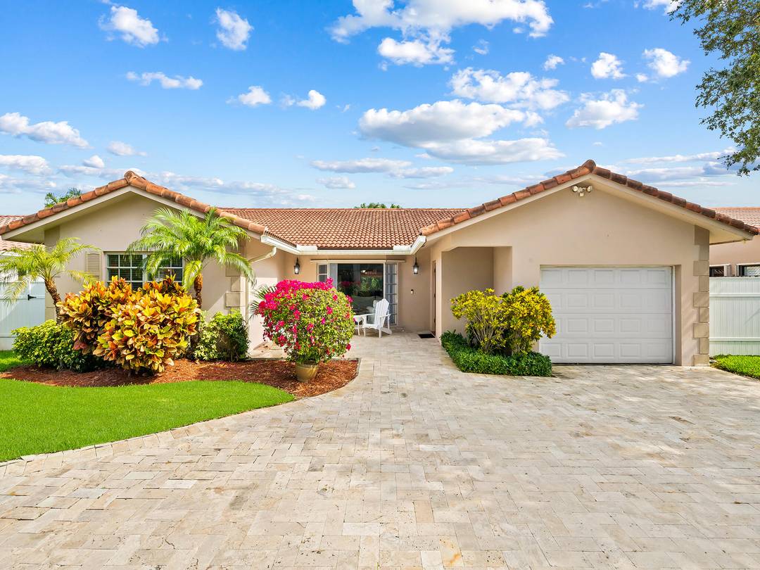 Nestled in the gated Terra Mar neighborhood of Lauderdale by the Sea, this spacious 3 bedroom, 2.