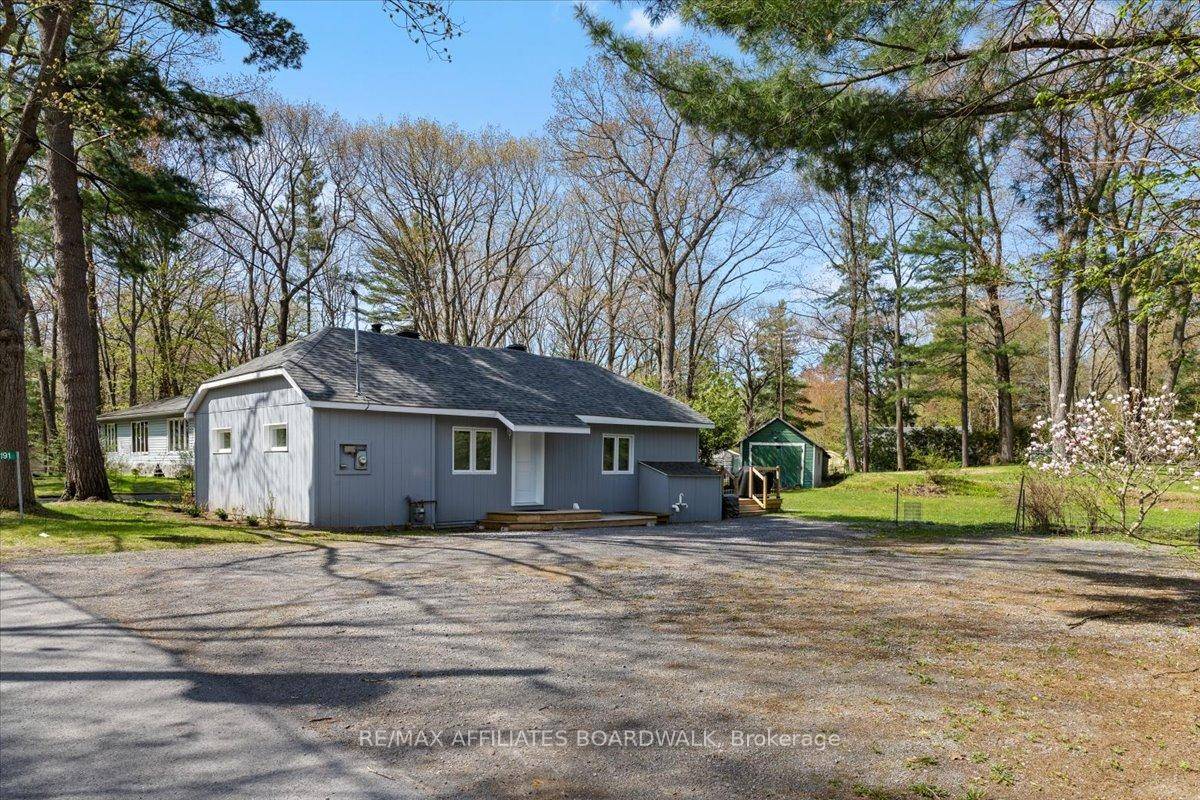 Welcome to 191 MacMillan Lane, a beautifully renovated 2 bed, 1 bath bungalow situated on an elevated DOUBLE lot in the heart of Constance Bay.