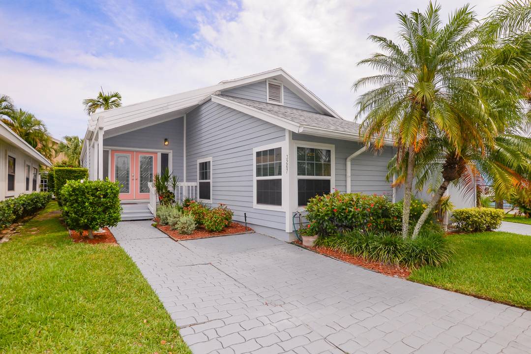 This stunning key west style 3 2 beach house is the perfect way to spend your Florida vacation.