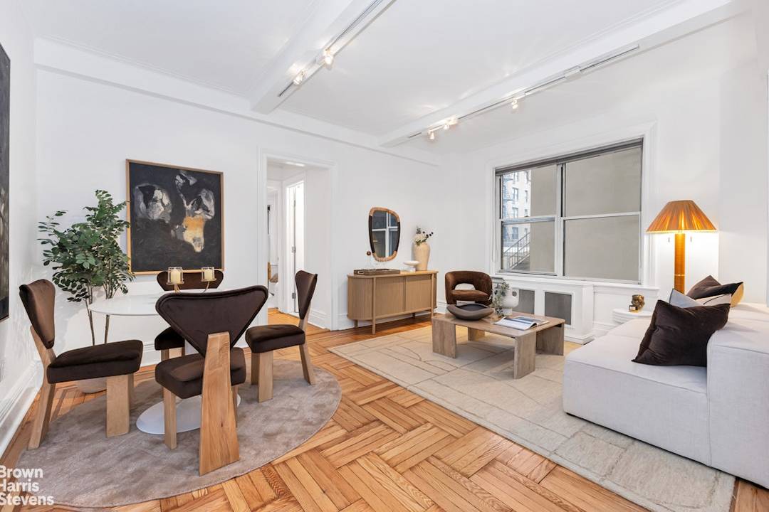 Quiet Corner One Bedroom on a Coveted Tree Lined Block Near Columbus Circle Utterly charming and spacious, this home offers the rare combination of pre war character, excellent storage, and ...