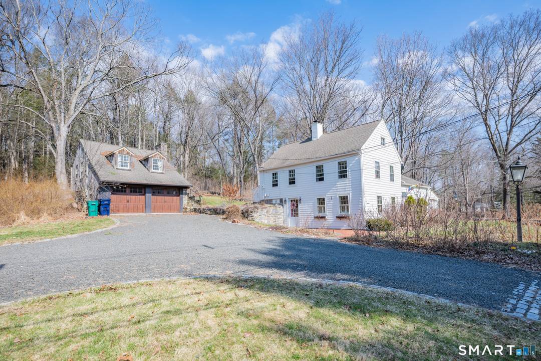 Charming antique two family property in the heart of Woodbury featuring a main residence plus a separate legal apartment over the detached 2 car garage ideal for rental income, in ...