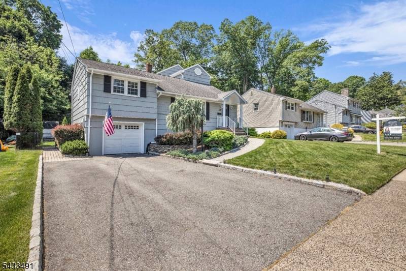 Nestled on a quiet cul de sac in one of Cedar Grove's most desirable locations, this beautifully maintained home offers the kind of layout buyers dream about !