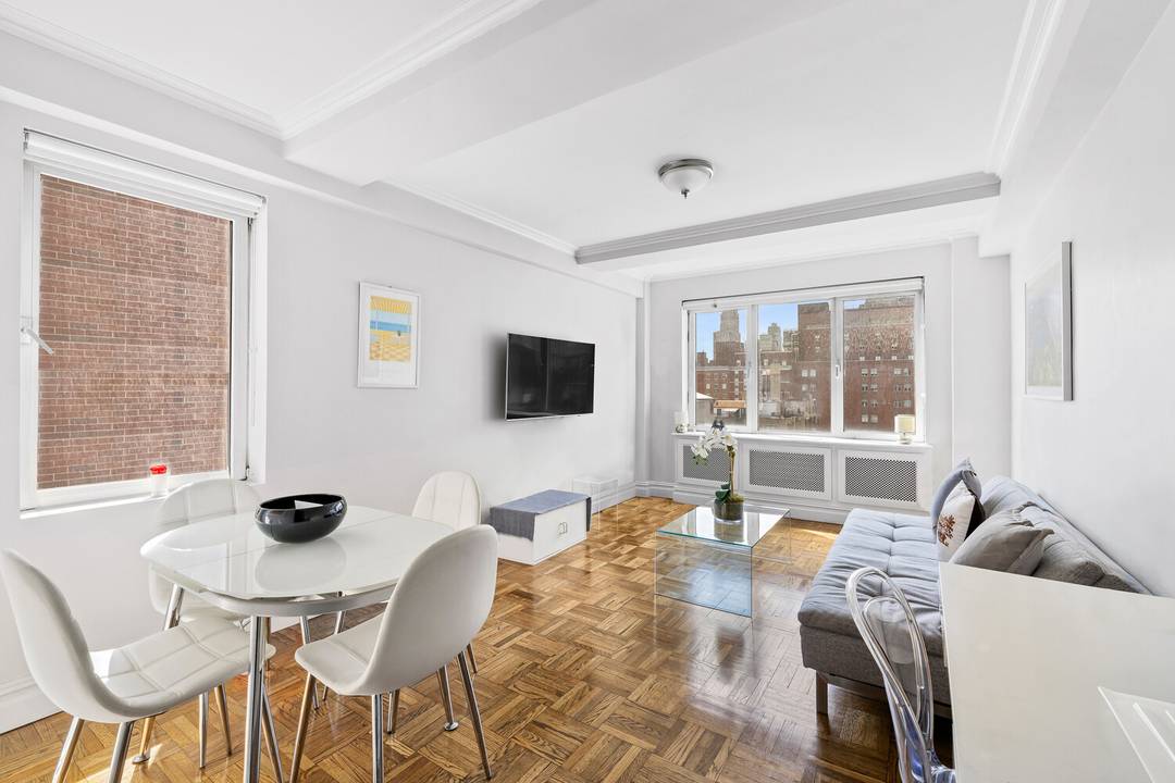 Enjoy open south facing views from this 12th floor corner one bedroom residence, ideally located in a full service cooperative on 79th Street between Park and Lexington Avenues.